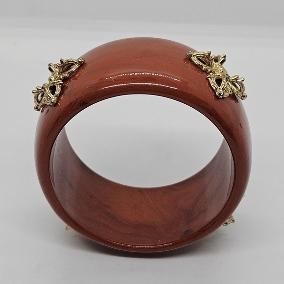 wide red-orange acrylic bangle bracelet with gold tone details - Picture 2 of 3